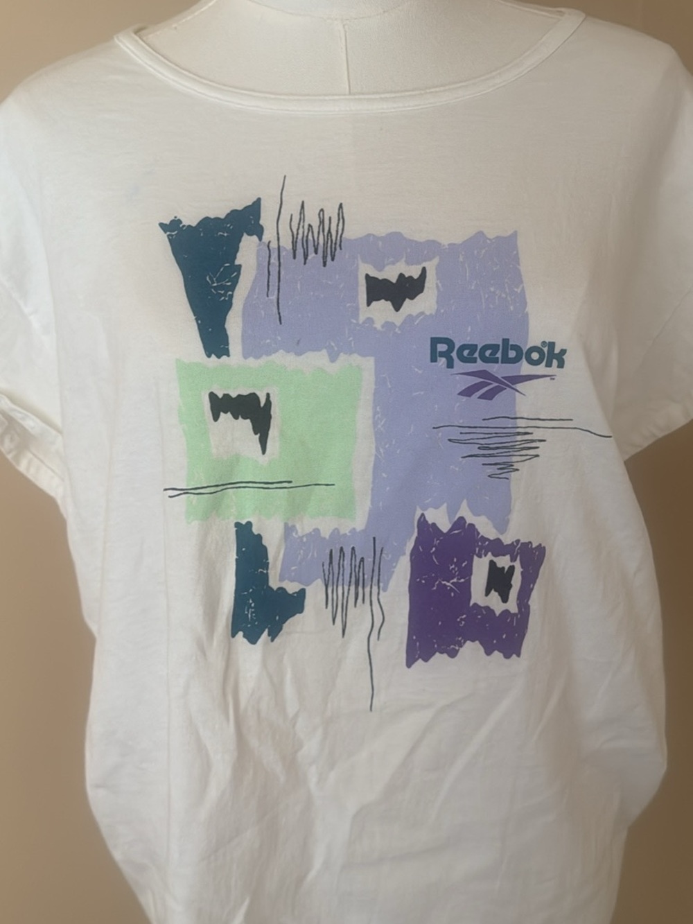 Reebok White Tee with Pastel Mint, Lavender & Teal Graphic